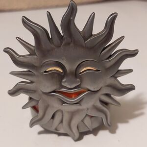 Pewter smiling sun tealight candle holder 3 1/2" h, 3"w, 2 5/8" d WITH candle
